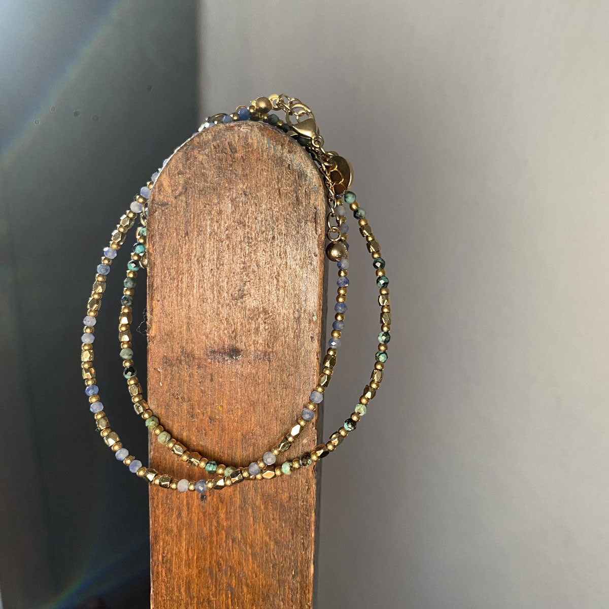 Bracelet, thin with green stones